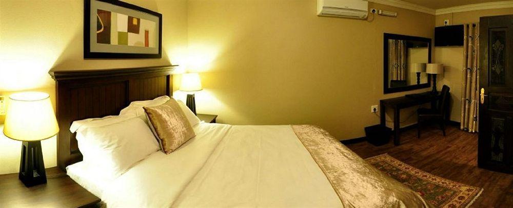 อีโคพาร์ค ลอดจ์ Hotel เซนทูเรียน ภายนอก รูปภาพ