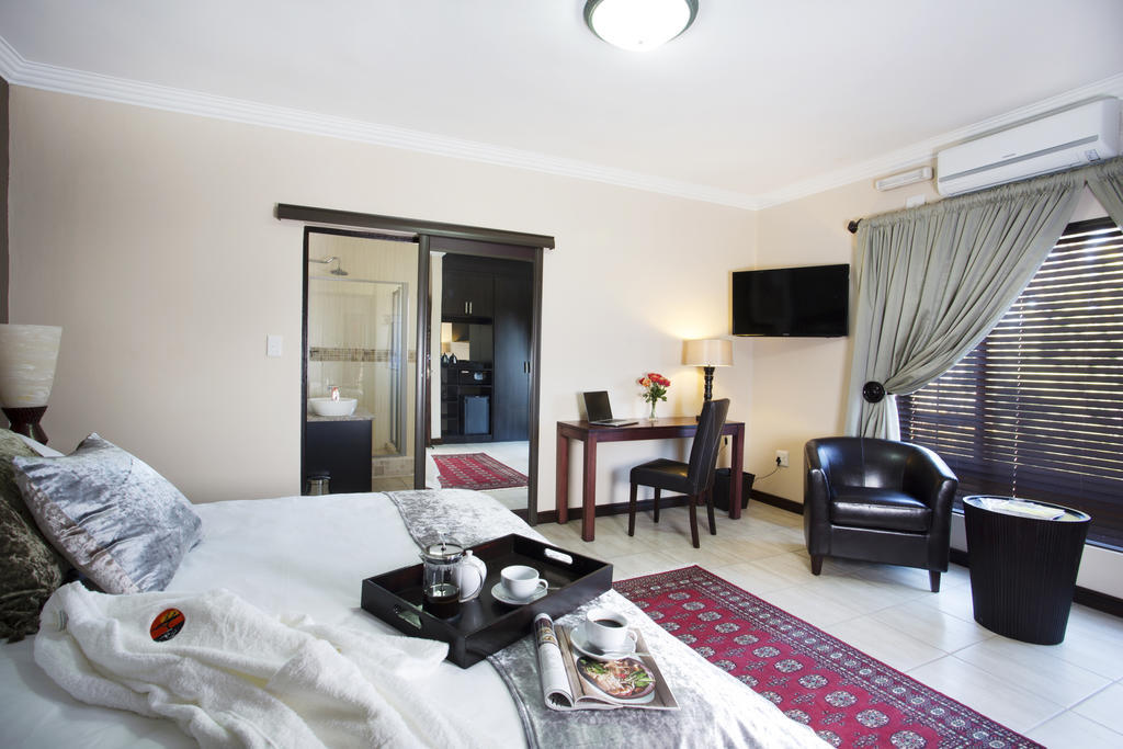 อีโคพาร์ค ลอดจ์ Hotel เซนทูเรียน ห้อง รูปภาพ